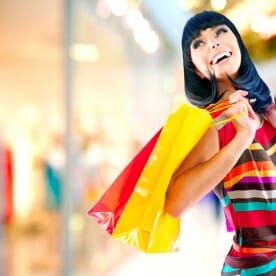 young woman with shopping bags