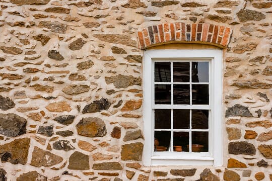 Window on a Stone Wall at Old Salem Museum in Winston-Salem, North Carolina